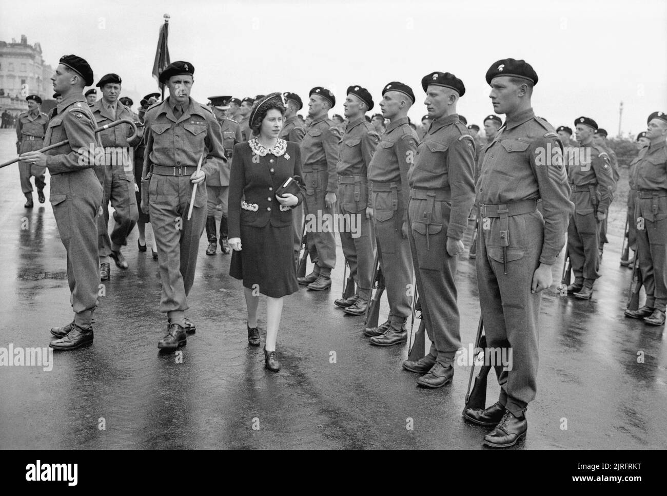 Allied Preparations For D-day Princess Elizabeth inspecting an honour guard during a Royal visit to 2nd (Armoured) Battalion Grenadier Guards, 5th Guards Armoured Brigade, Guards Armoured Division, at Hove, 17 May 1944. Stock Photo