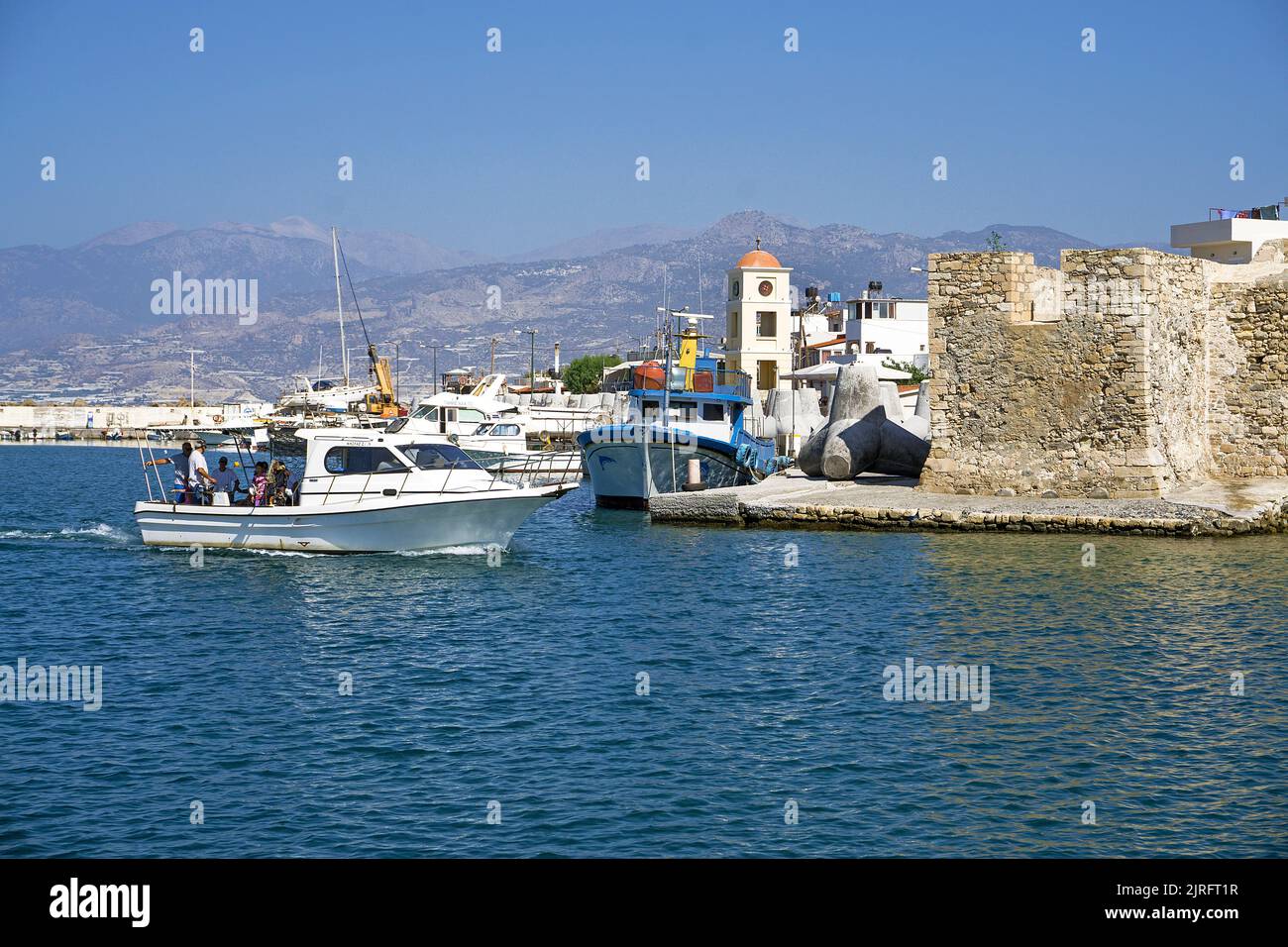 Fishing boats in the harbour of Ierapetra, old venetian Fortress, Ierapetra is the most southern city of Greece, Crete, Greece, Europe Stock Photo