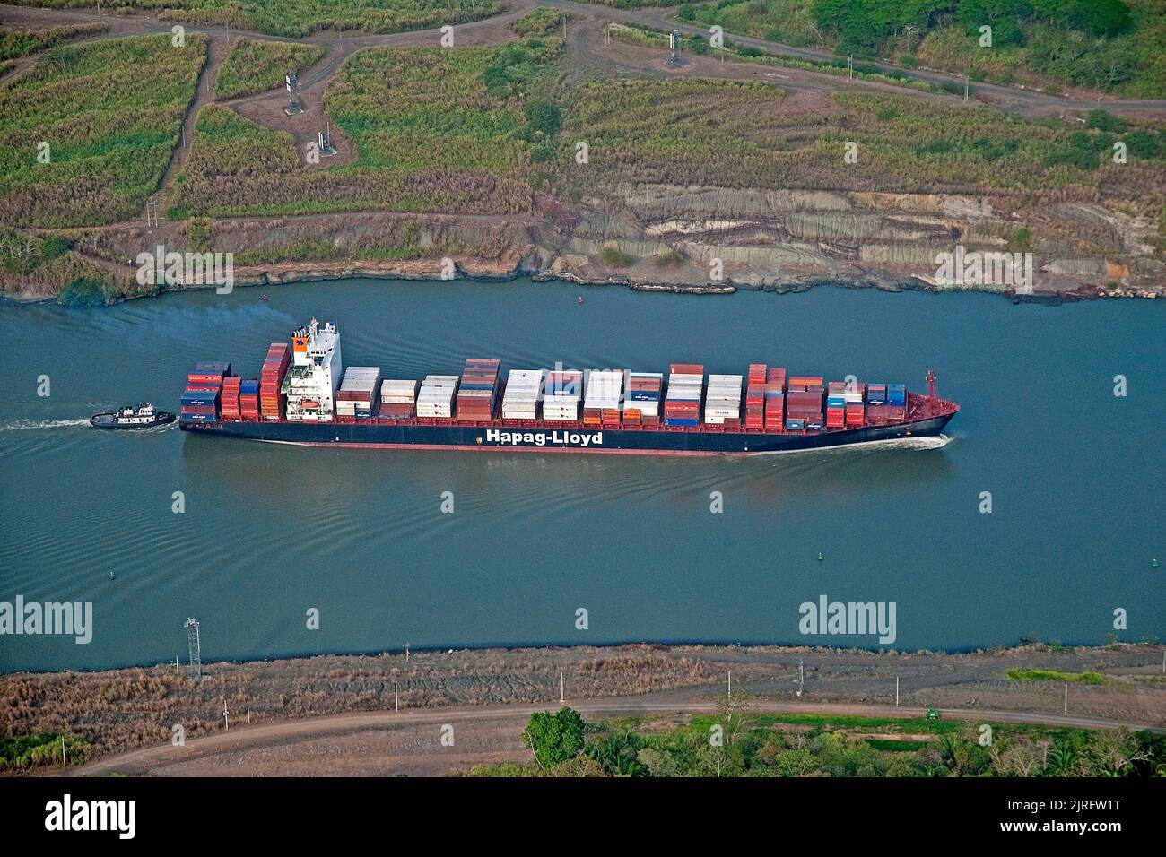 Hapag Lloyd container ship on Panama Canal, most important artificial water way in the word, Panama Stock Photo