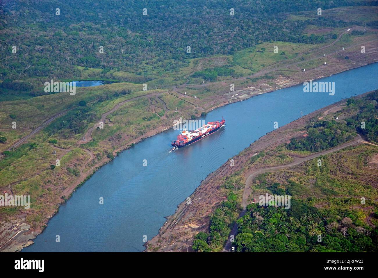 Hapag Lloyd container ship on Panama Canal, most important artificial water way in the word, Panama Stock Photo