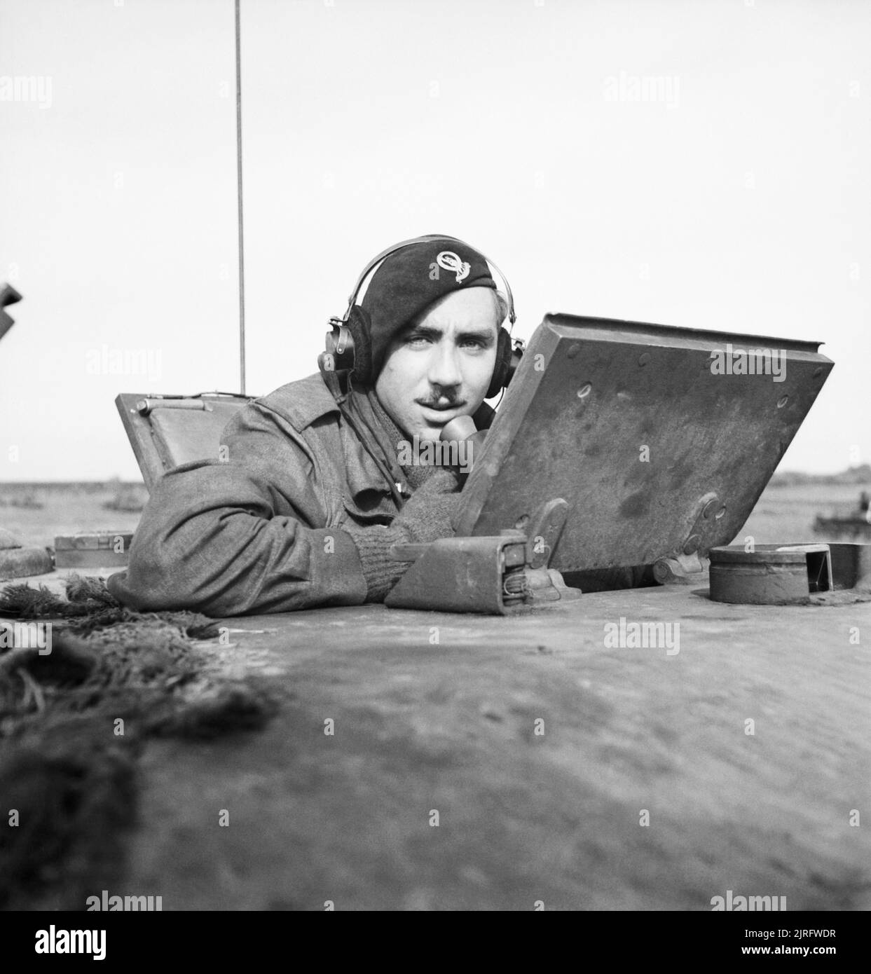 The British Army in North-west Europe 1944-45 Trooper G Loyon of Liverpool, the loader/radio-operator of a Challenger tank of 15/19th Hussars, 11th Armoured Division, Holland, 17 October 1944. Stock Photo