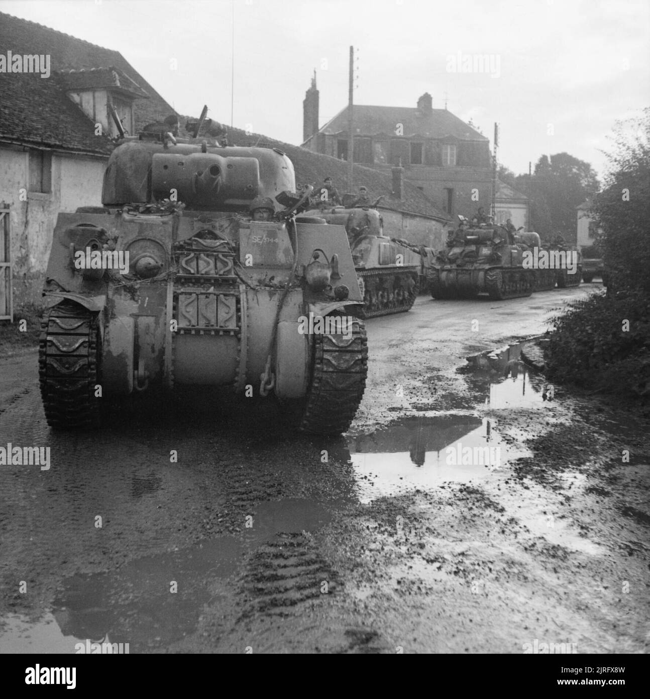 The British Army in Northwest Europe 194445 Sherman tanks of Guards Armoured Division passing