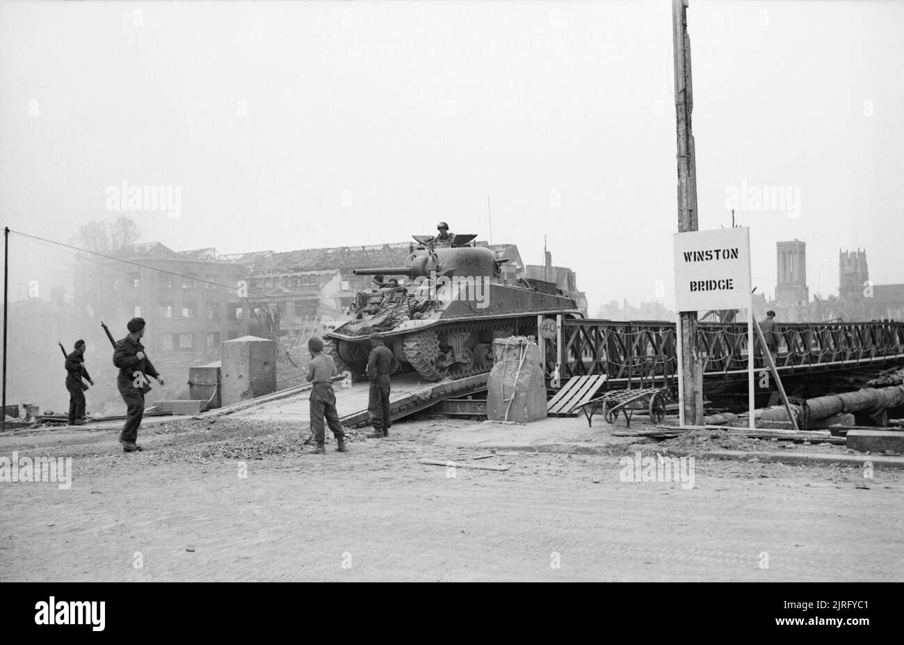 The British Army in the Normandy Campaign 1944 A Sherman tank crosses 'Winston Bridge', a Bailey bridge built over the River Orne for the 'Goodwood' offensive, 24 July 1944 Stock Photo