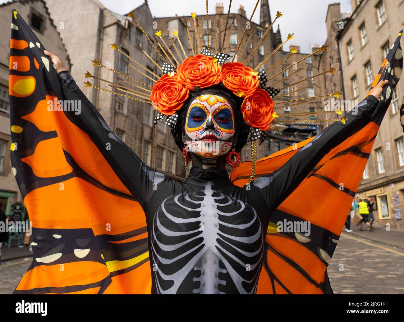 Edinburgh, Scotland, UK. 24th August 2022. Dancers in costume from the Banda Monumental de Mexico pose in Edinburgh Old Town today. Their production of Day of the Dead is performed each night at the Royal Edinburgh Military Tattoo. Iain Masterton/Alamy Live News. Stock Photo