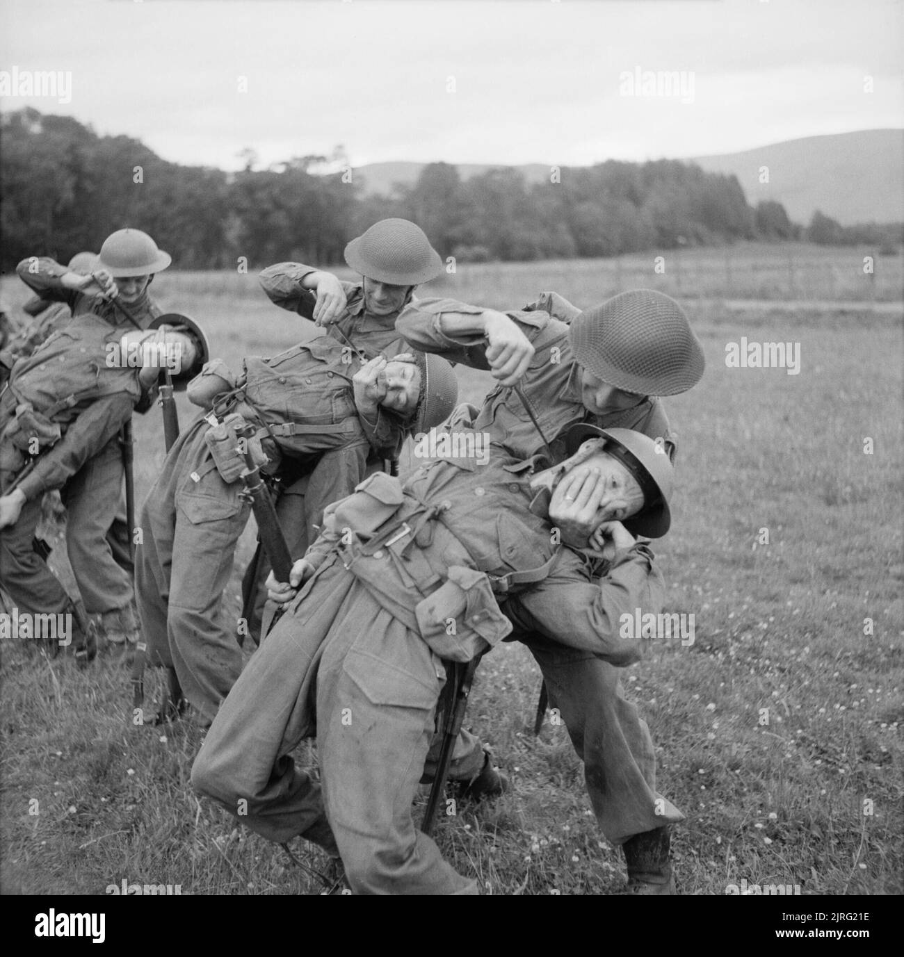 The Home Guard during the Second World War Home Guard soldiers practise close-quarter combat with commando knives at the Commando Basic Training Centre at Achnacarry in the Highlands of Scotland, 26 July 1943. Stock Photo