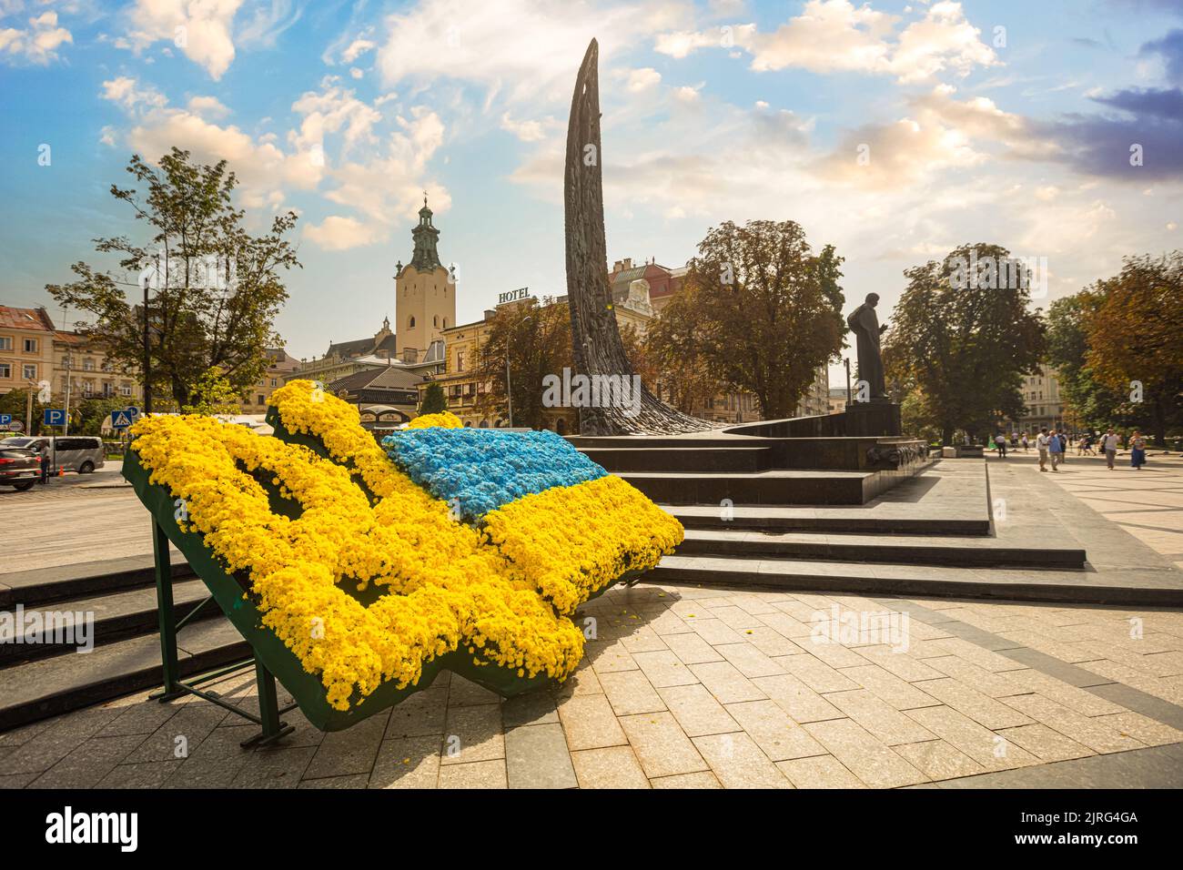 Flowerbed in form of Ukraine national emblem and flag near Taras ...