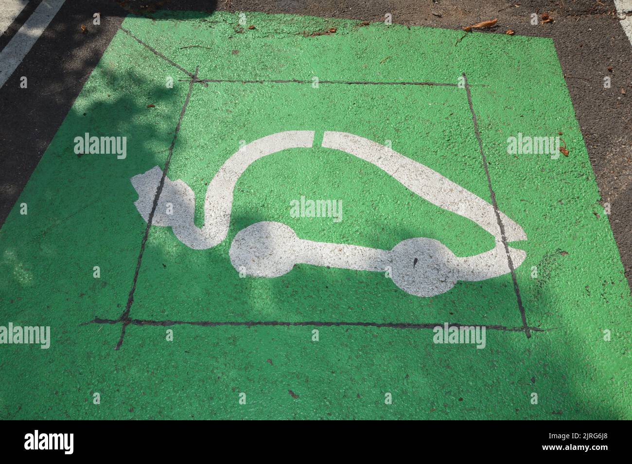 Electrical vehicle charging station sign on the ground in France Stock