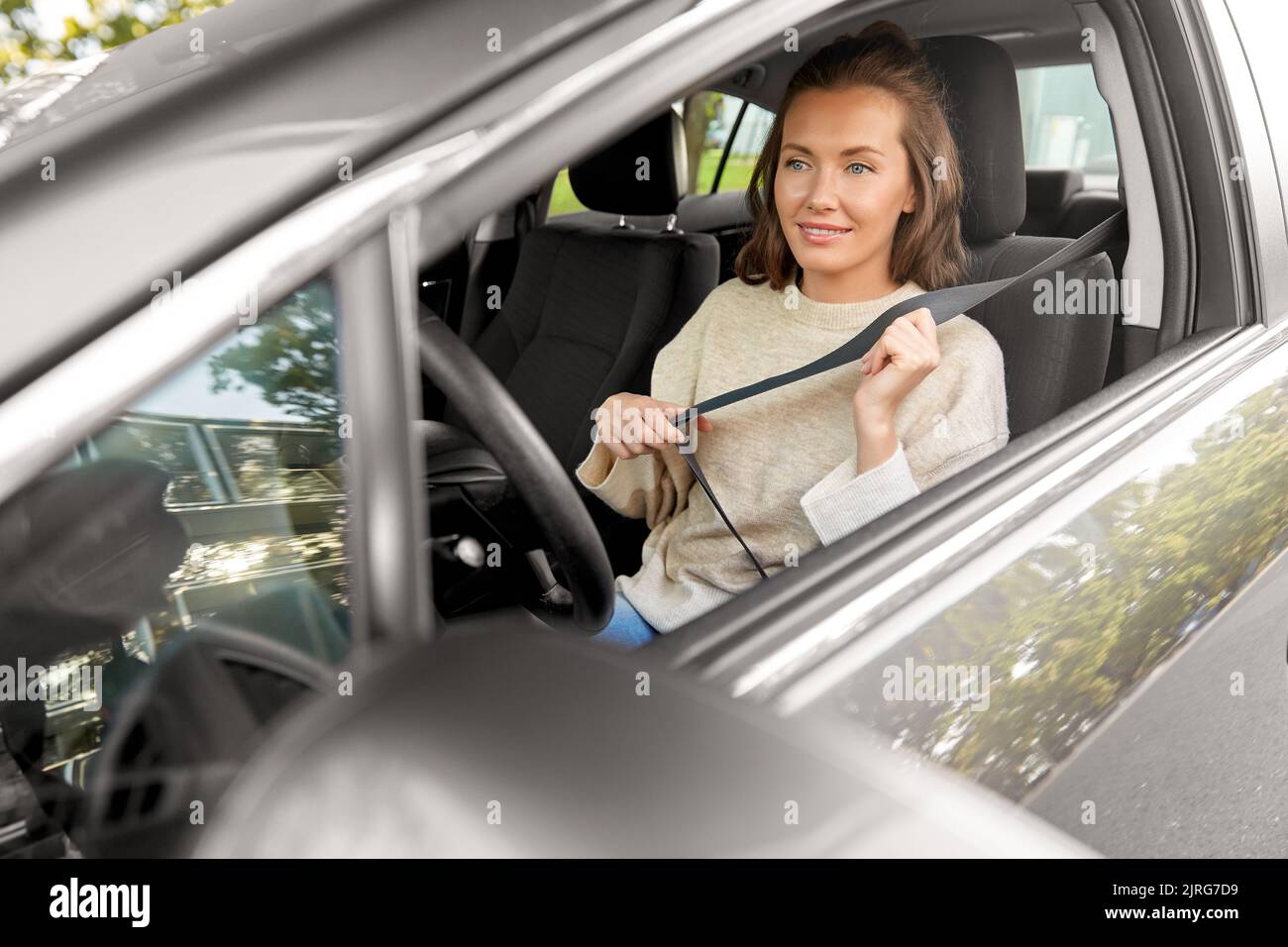 Woman car seatbelt seat belt hi-res stock photography and images - Alamy