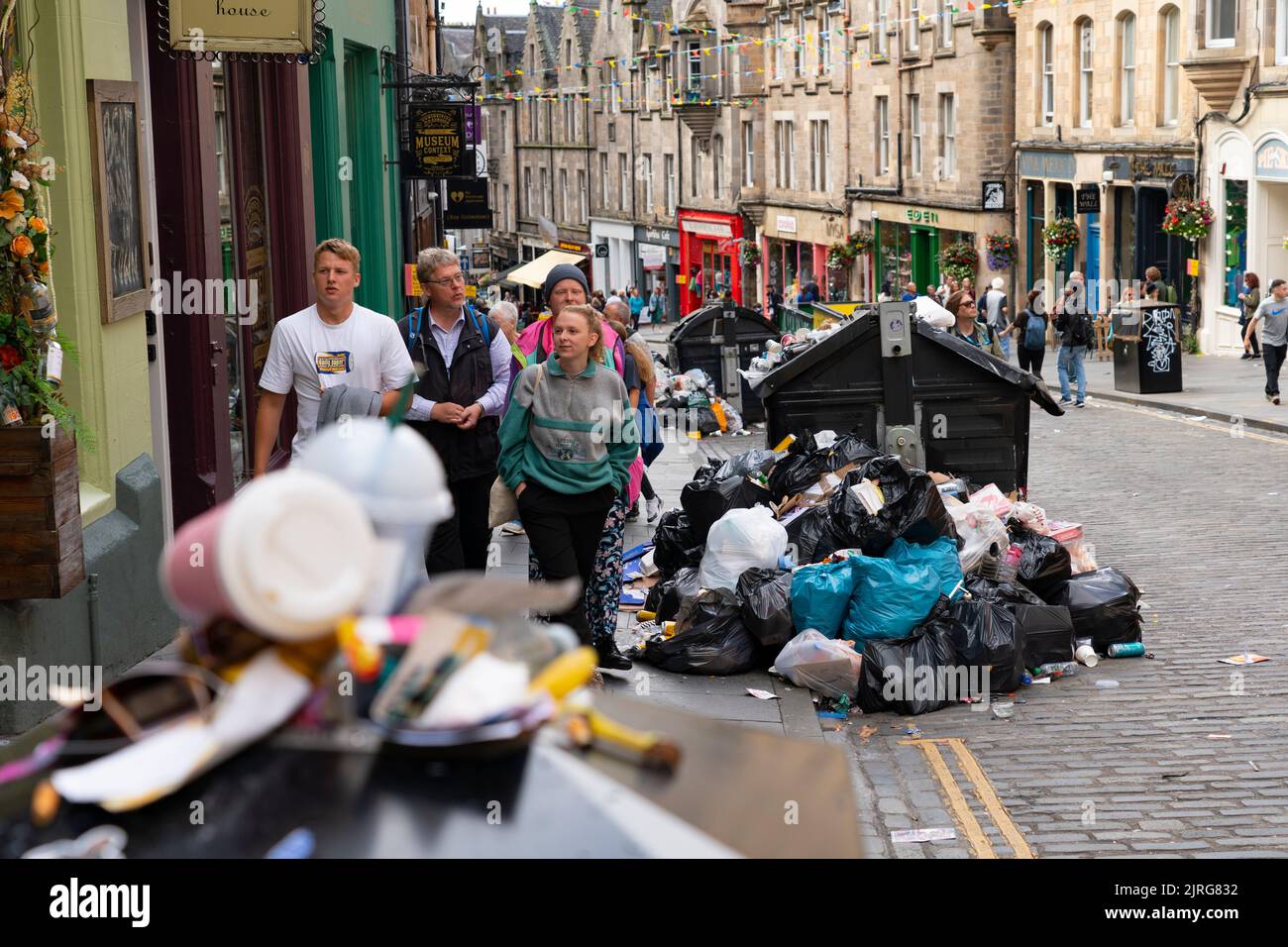 Edinburgh, Scotland, UK. 24th August 2022. Rubbish is seen piled on the streets of Edinburgh city centre on day seven of a 12 day strike by city refuse collectors.  Iain Masterton/Alamy Live News Stock Photo