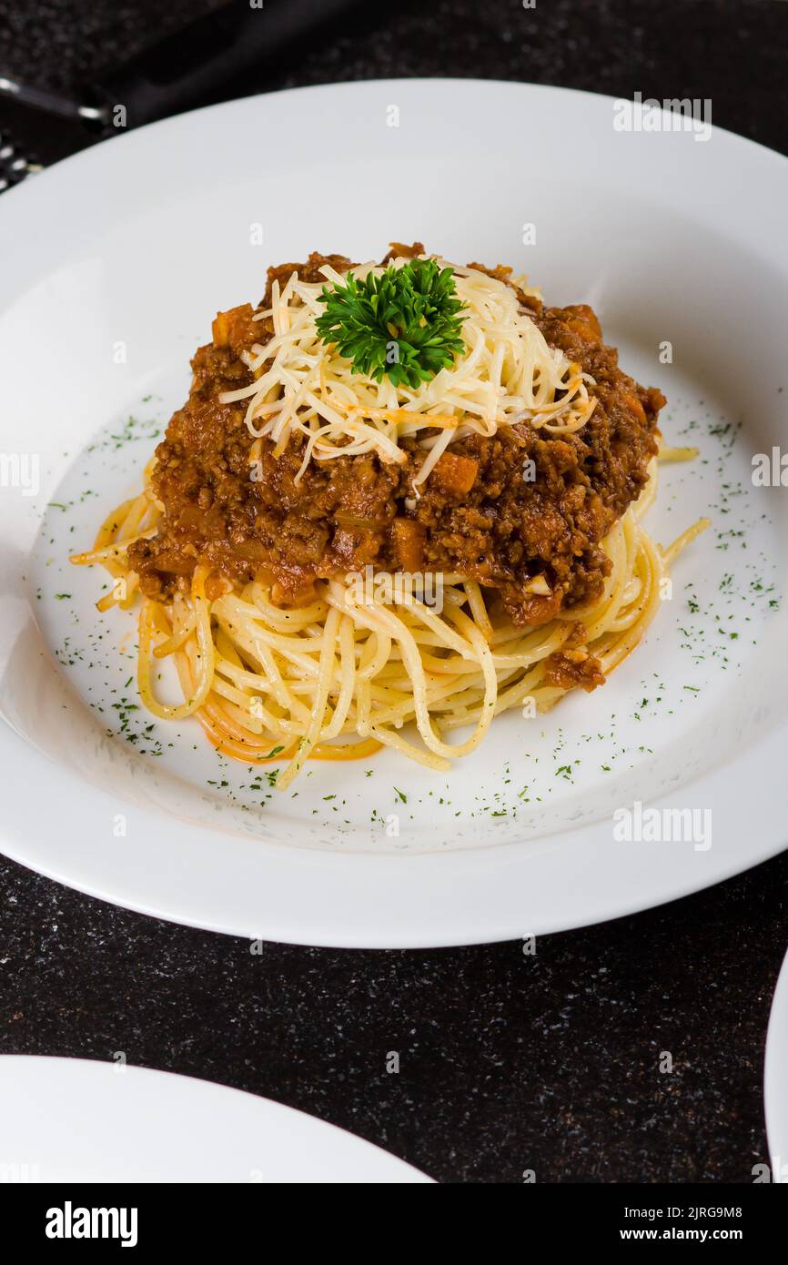 Traditional italian pasta spaghetti with bolognese meat sauce and