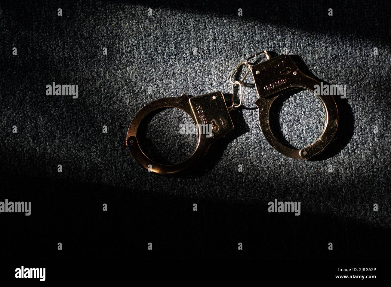Rope handcuffs hi-res stock photography and images - Alamy