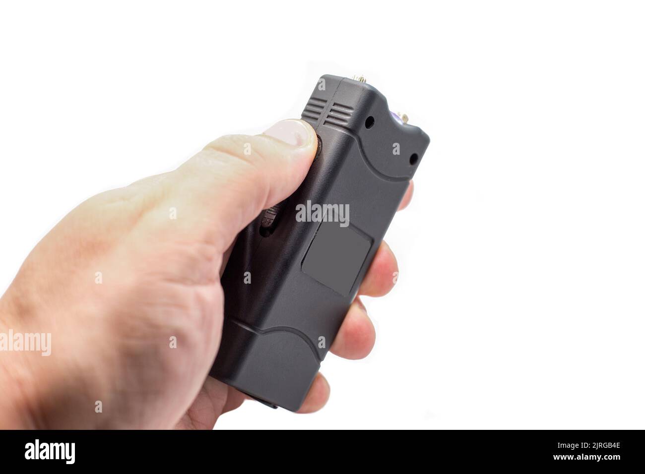 Taser a man's hand, close-up, isolated on a white background. Stock Photo