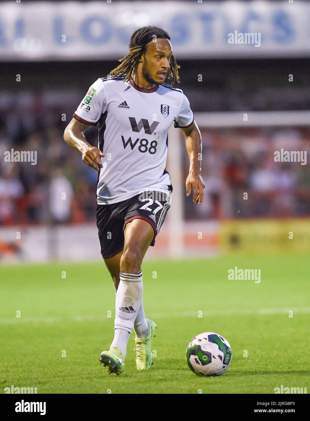 Kevin Mbabu of Fulham during the EFL Carabao Cup Round Two match between Crawley Town and Fulham at the Broadfield Stadium  , Crawley ,  UK - 23rd August 2022  Editorial use only. No merchandising. For Football images FA and Premier League restrictions apply inc. no internet/mobile usage without FAPL license - for details contact Football Dataco Stock Photo