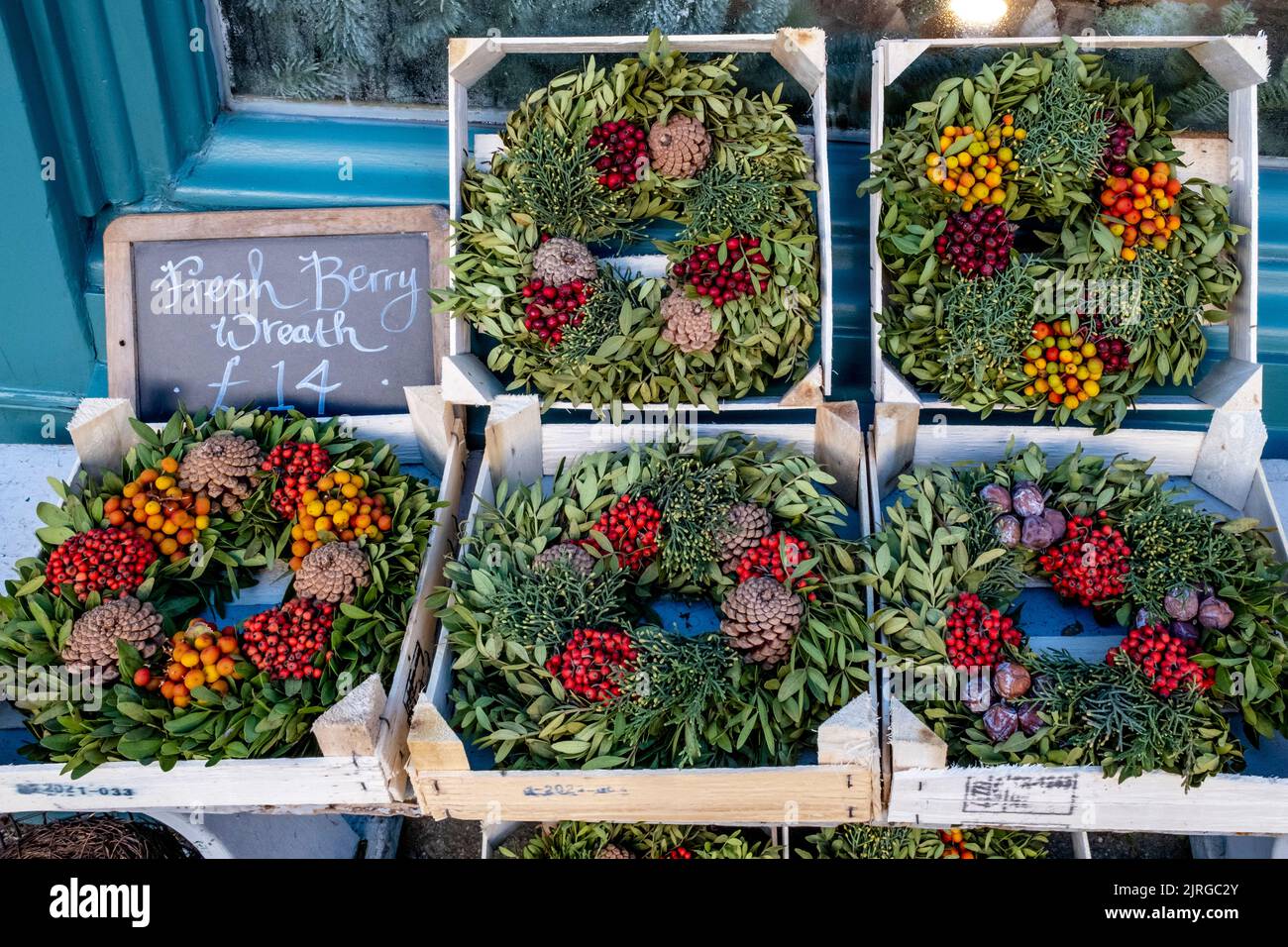 Christmas Wreaths For Sale Outside A Shop In The High Street, Lewes