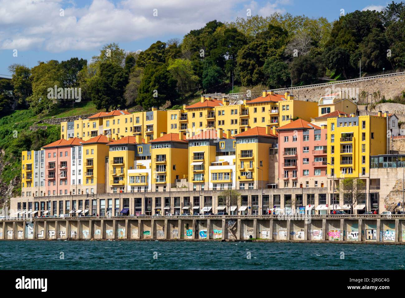 Modern flats on the banks of the River Douro in Porto a major city in northern Portugal. Stock Photo