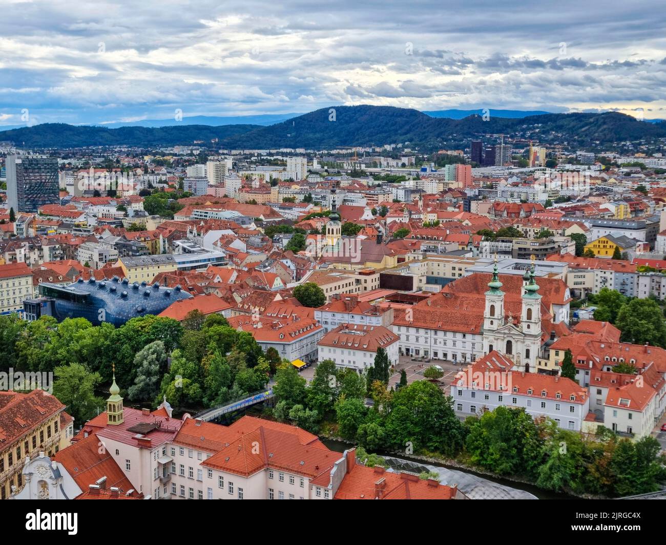 Beautiful view over the old city center of Graz, with Mariahilfer church and historic buildings, in Styria region, Austria Stock Photo