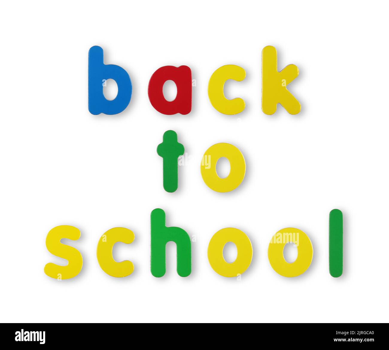 Back to school coloured magnet letters on white with clipping path concept Stock Photo