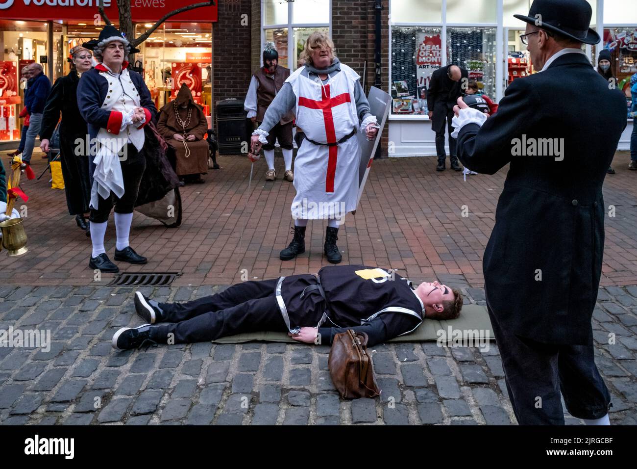 Sompting Village Morris Men Perform A Traditional Mummers Play In The High Street, Lewes, East Sussex, UK. Stock Photo