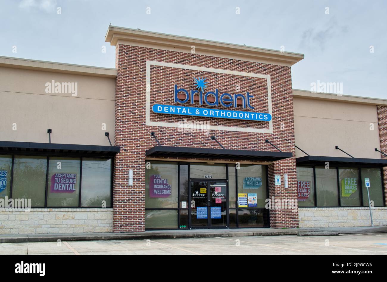 Houston, Texas USA 12-05-2021: Brident dental and orthodontics office building exterior in Houston, TX. Health and wellness local business chain. Stock Photo