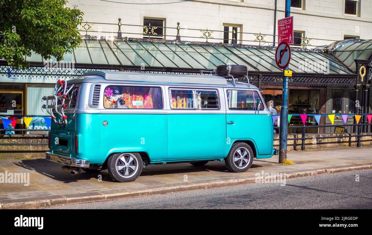 classic VW camper van parked on the kerb in Buxton Derbyshire peak ...