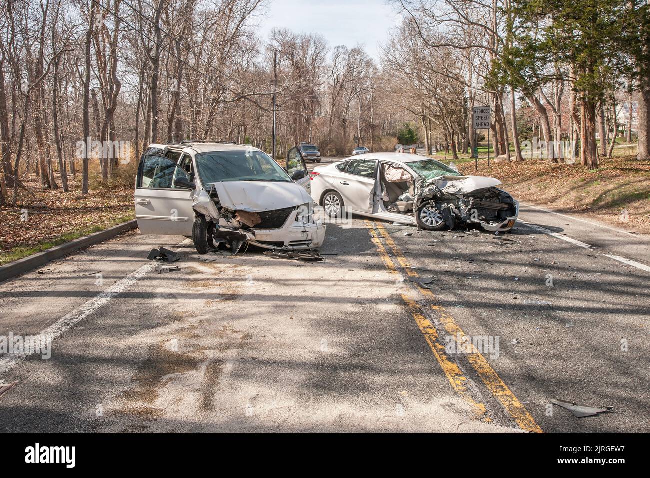 The wreckage of two vehicles after a three-car motor vehicle accident in front of 342 Ferry Road on Sunday, 4/19/15 Stock Photo