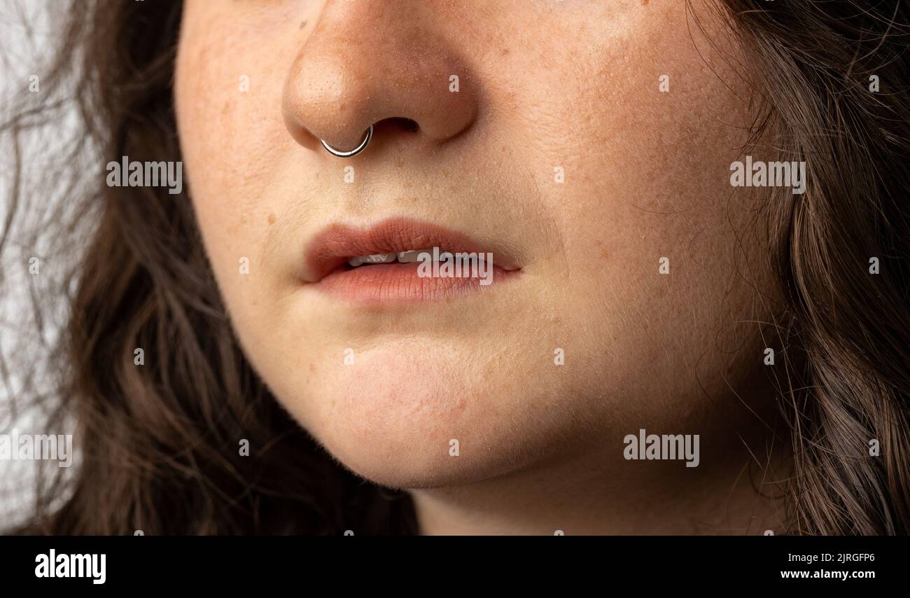 Close up of young woman with septum piercing. Stock Photo