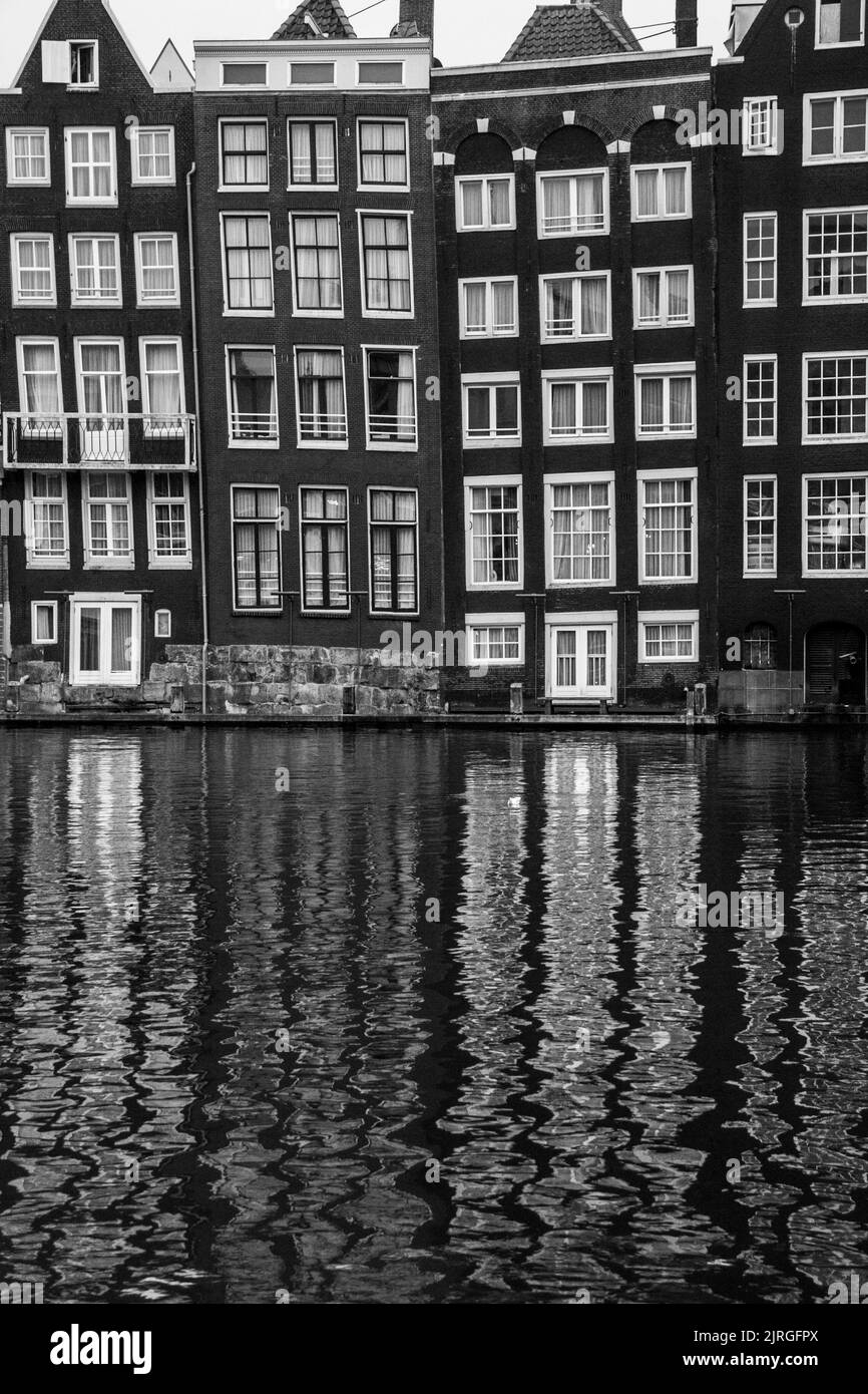 Reflection of Amsterdam's buildings in black and white Stock Photo
