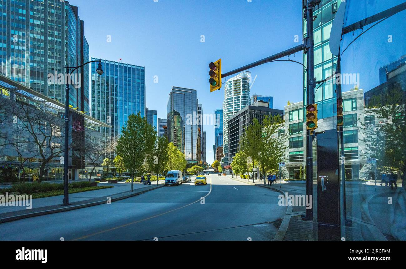A road with traffic lights and cars in Vancouver, Canada Stock Photo