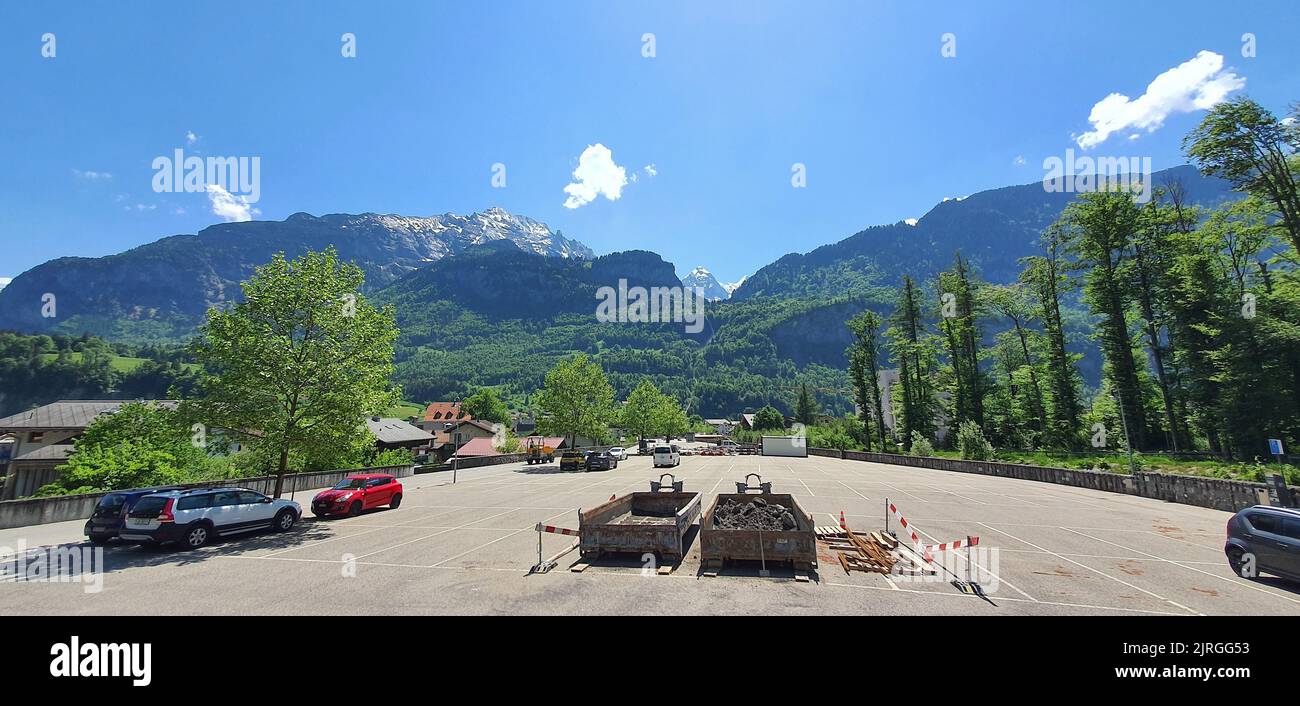 A scenic view of a mountainous landscape in Meiringen village in Norway on a sunny day Stock Photo