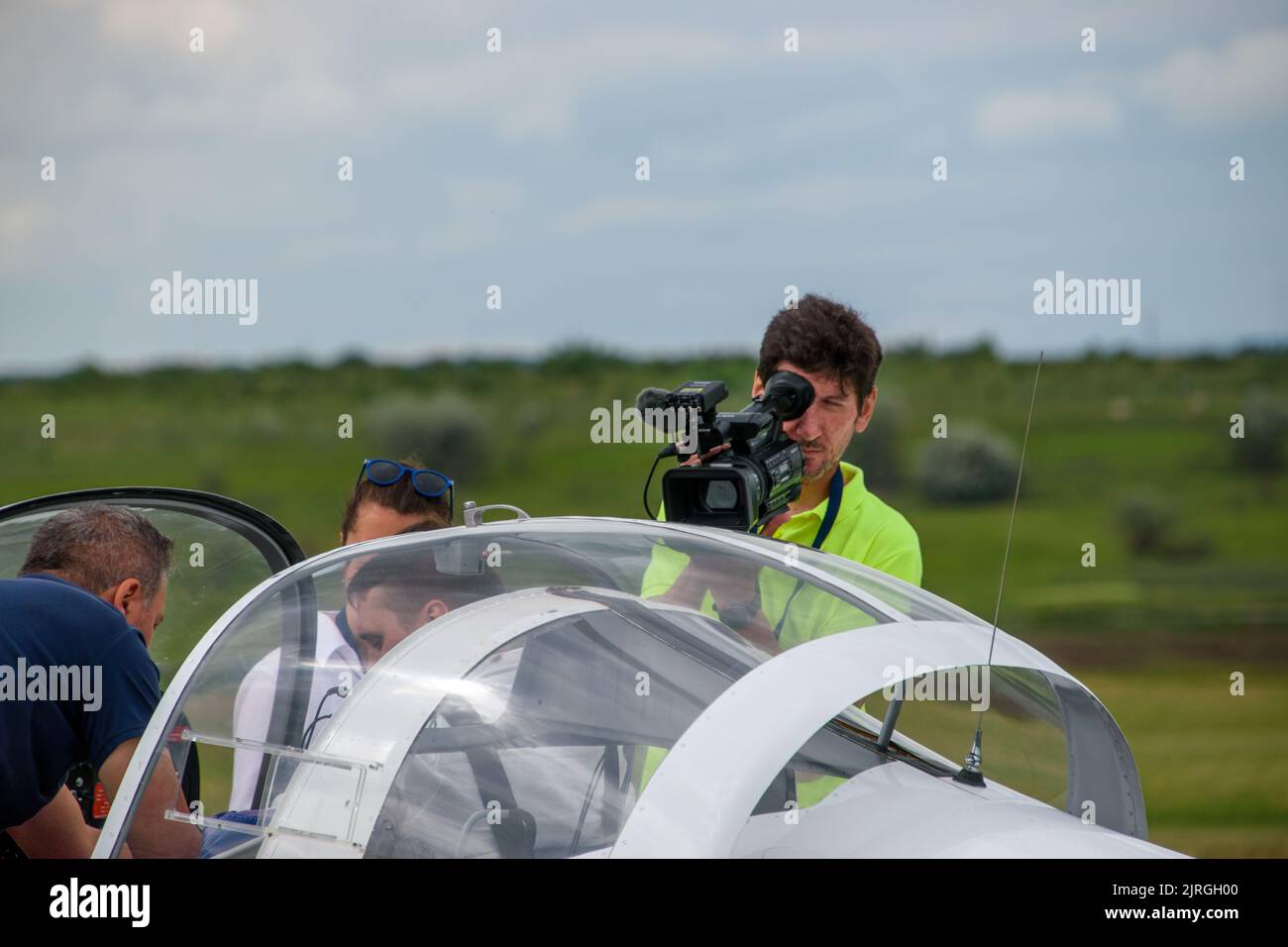 The Television crew interviewing the pilots at Hangariada - aeronautical festival in Iasi Stock Photo