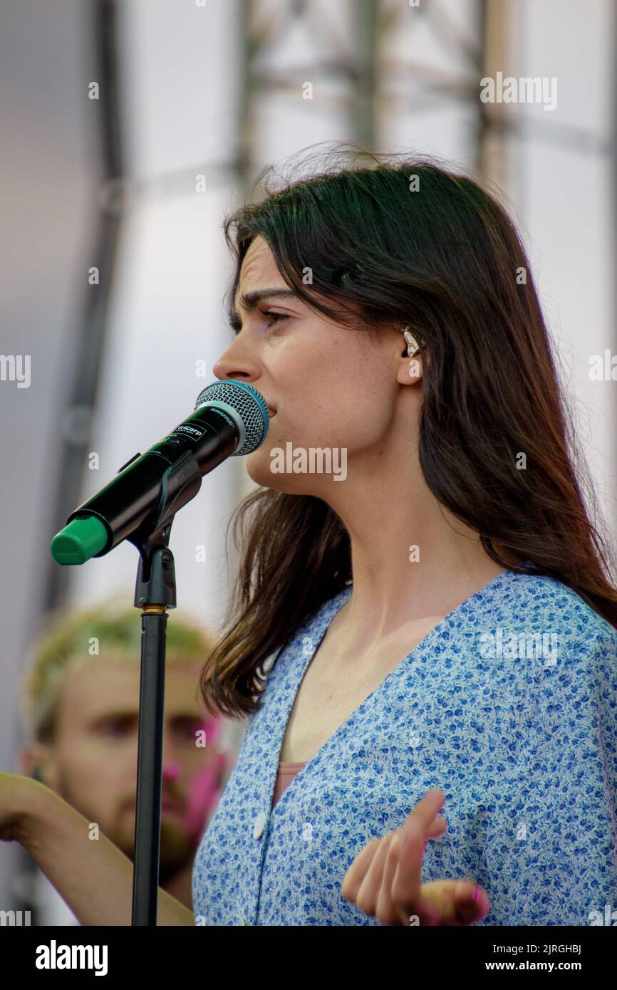 A vertical shot of valeria stoica singing at her live concert at