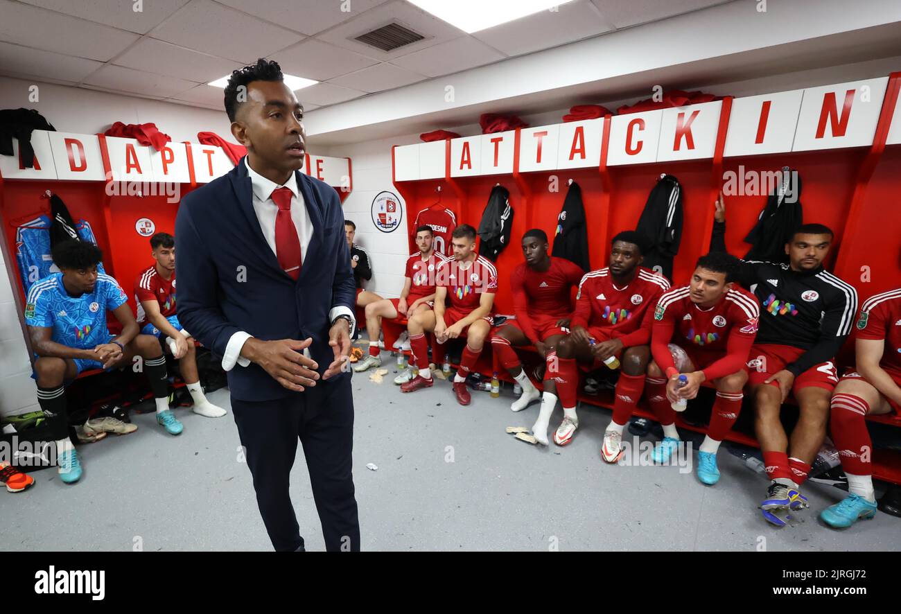 Crawley Town's manager Kevin Betsy gives his post match team talk after beating Fulham 2-0 during the second round of the Carabao Cup between Crawley Town and Fulham at the Broadfield Stadium in Crawley. 23rd August 2022 Stock Photo