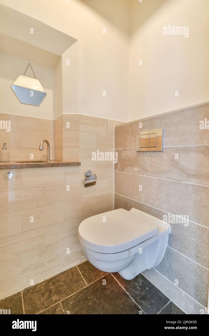 Modern home interior design of white bathroom with open bathtub and