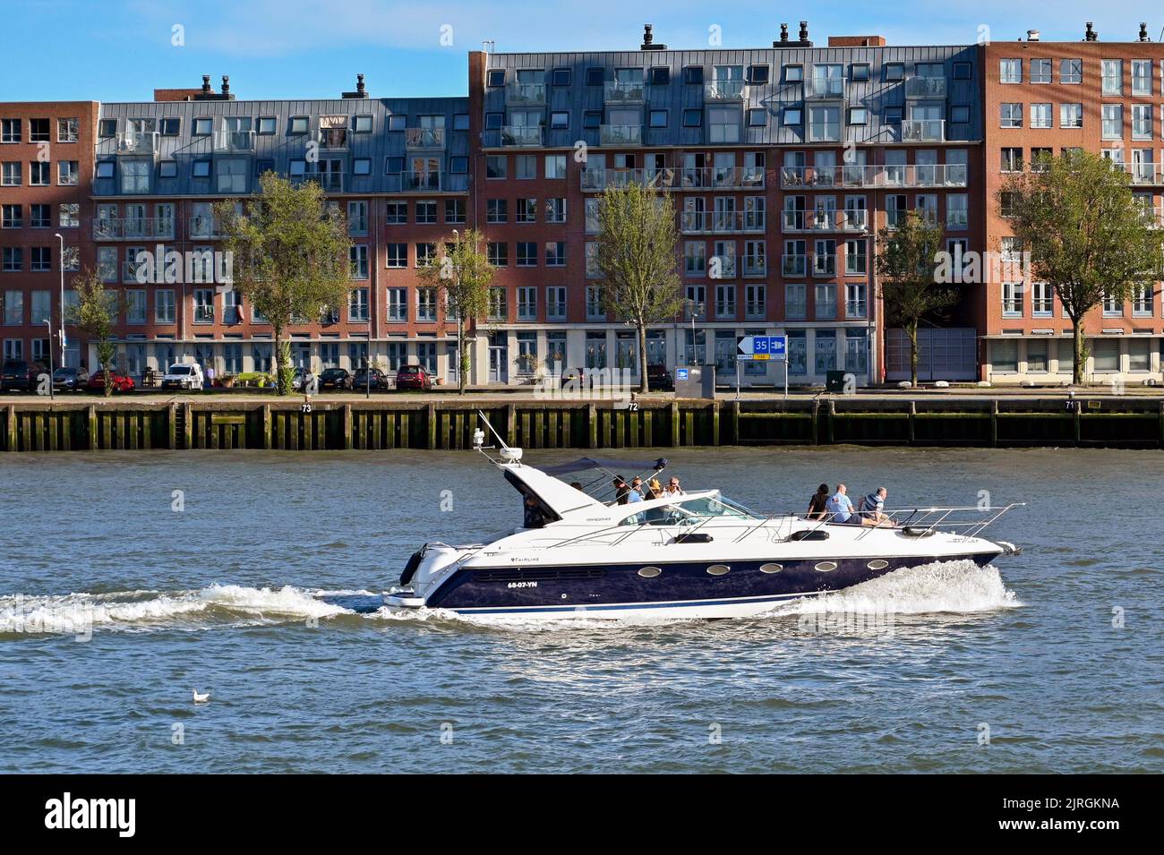 Rotterdam, Netherlands August 2022 Luxury motor boat with people on