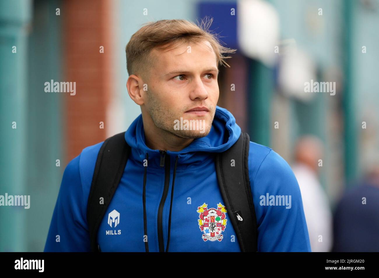 Elliott Nevitt 20 of Tranmere Rovers arrives at the ground before the
