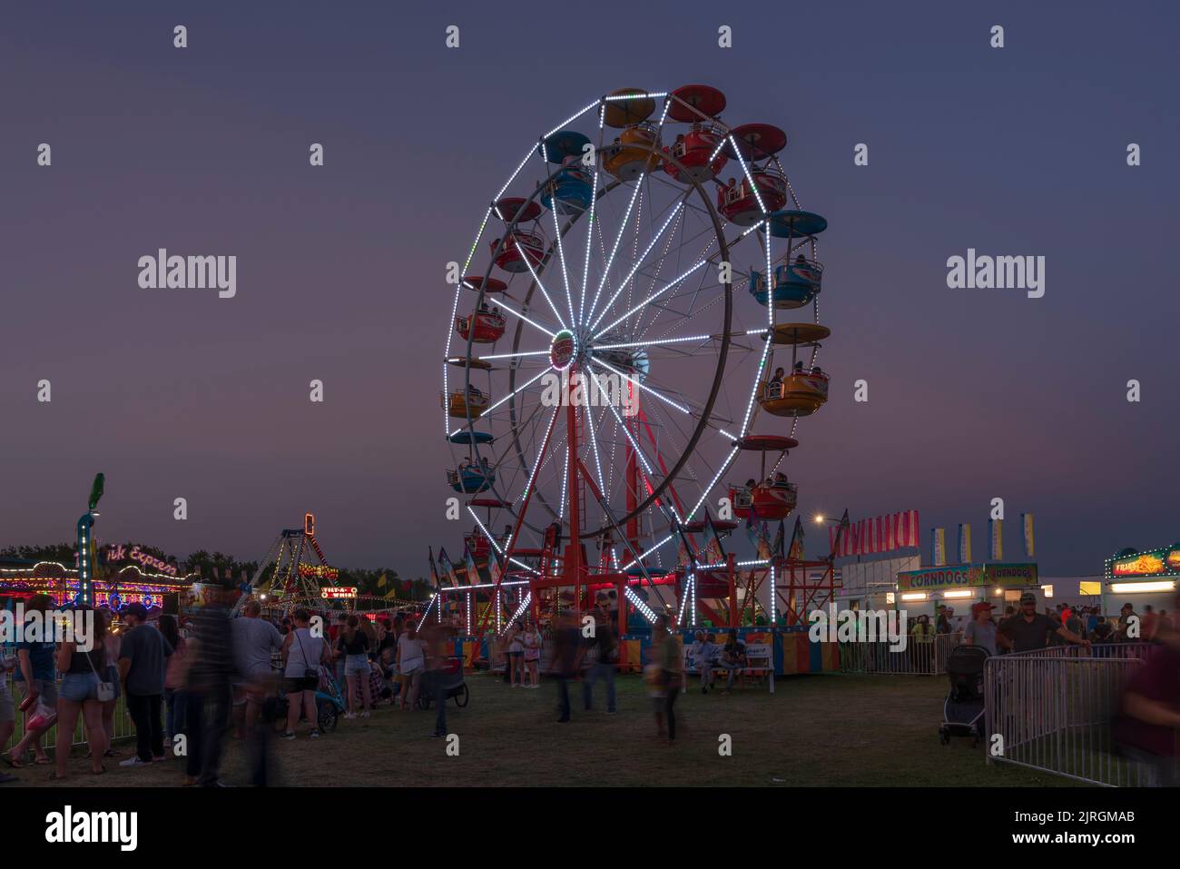 The Wonder Shows midway illuminated at night at the Harvest Festival in