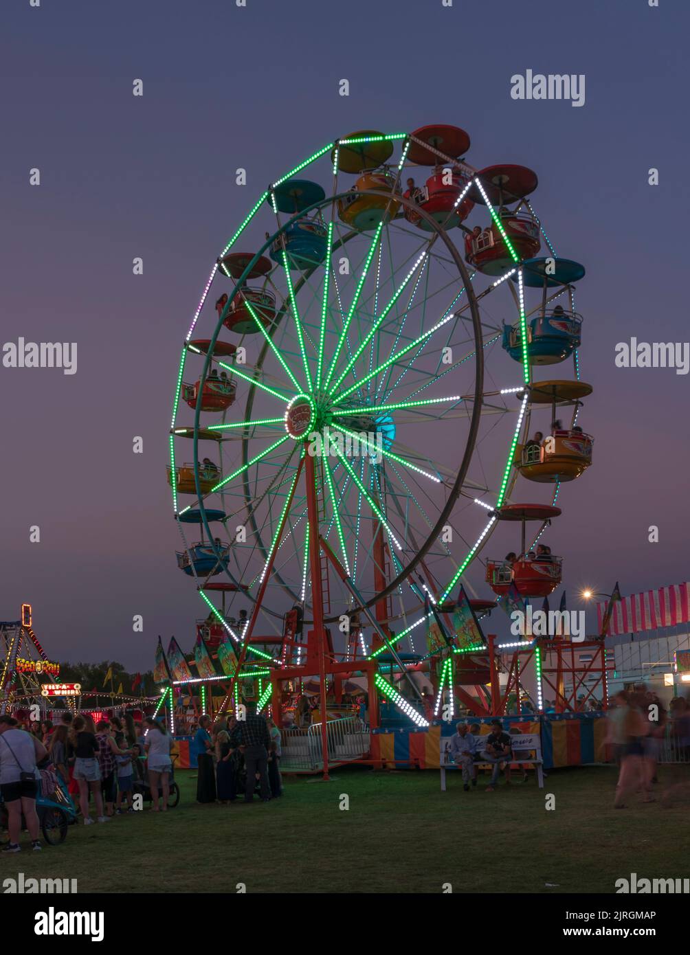 The Wonder Shows midway illuminated at night at the Harvest Festival in