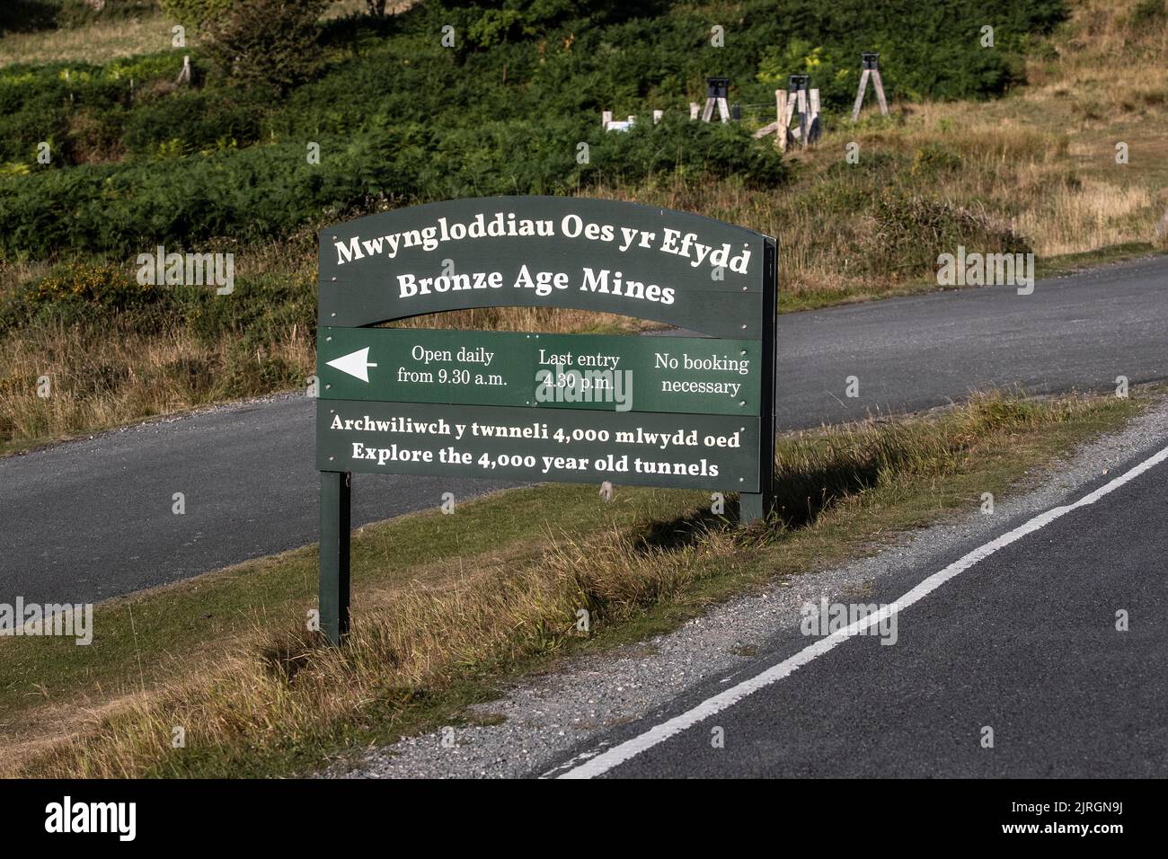 Public Information sign on the Great Orme headland at Llandudno indicating the entrance to the 4,000 year old tunnels to the Bronze Age Copper Mines Stock Photo