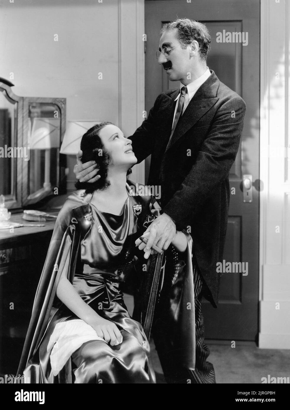 KITTY CARLISLE and GROUCHO MARX in A NIGHT AT THE OPERA 1935 director SAM WOOD writers George S. Kaufman and Morrie Ryskind producer Irving Thalberg Metro Goldwyn Mayer Stock Photo