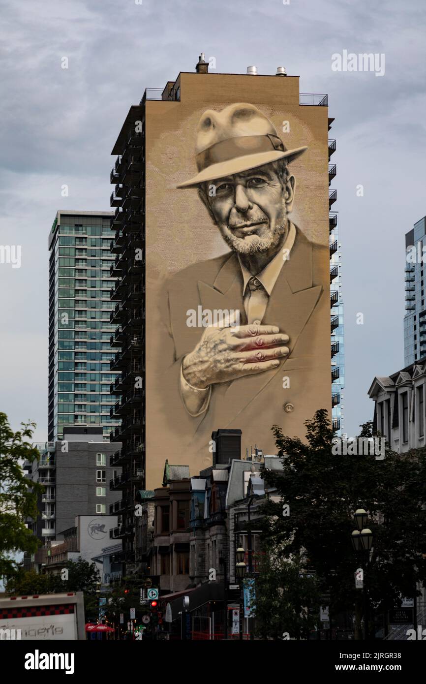 A portrait of Leonard Cohen painted onto the side of a building in Montreal, Quebec, Canada Stock Photo