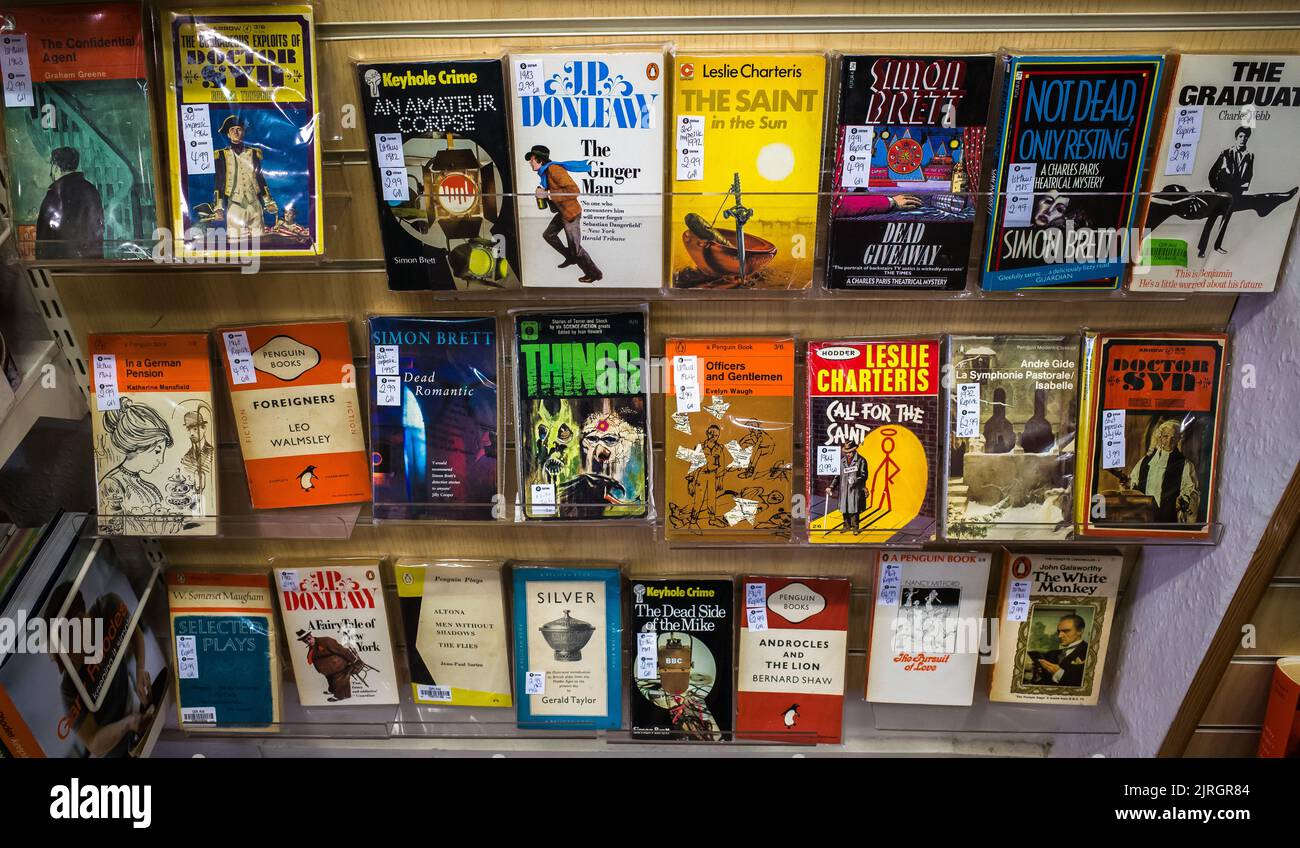 A selection of classic and retro fiction books in charity shop Oxfam. Stock Photo