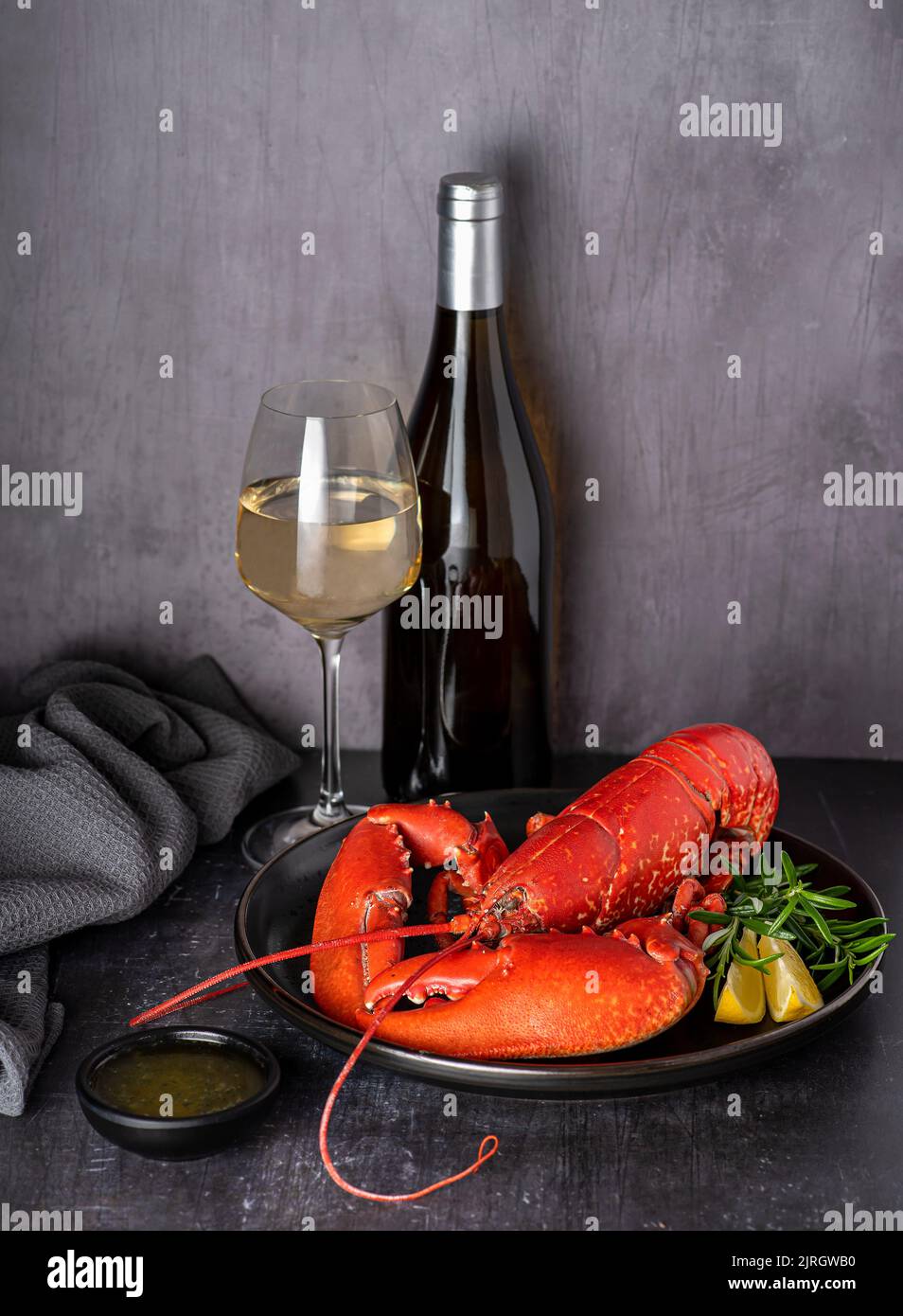 Food photography of lobster, wine, seafood, lemon, rosemary Stock Photo