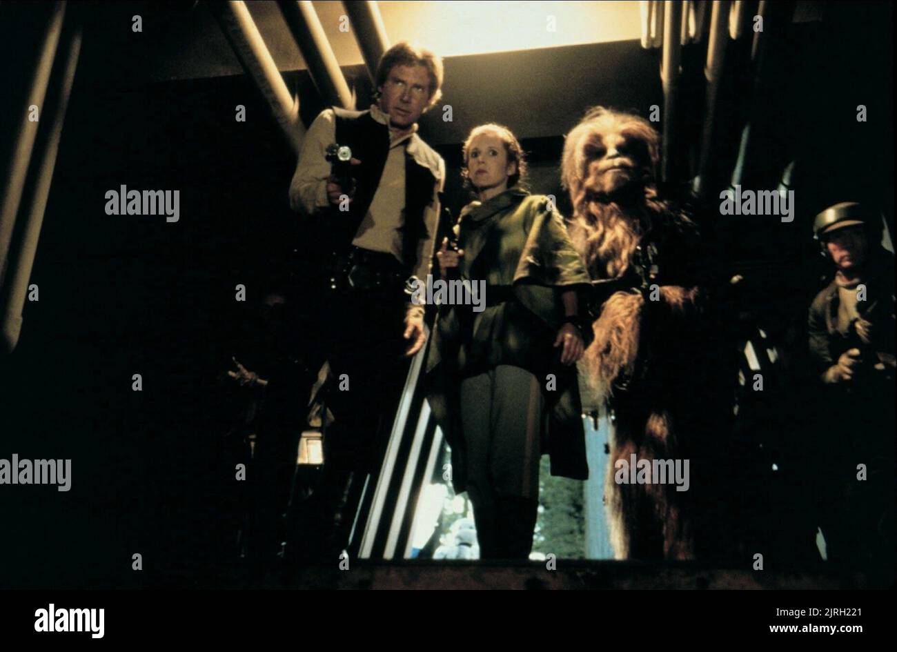 HARRISON FORD, CARRIE FISHER, PETER MAYHEW, STAR WARS: EPISODE VI - RETURN OF THE JEDI, 1983 Stock Photo