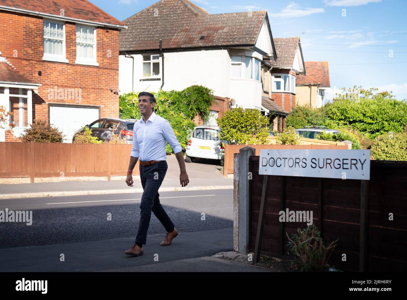 Rishi Sunak during a visit to his father's old doctors surgery where he