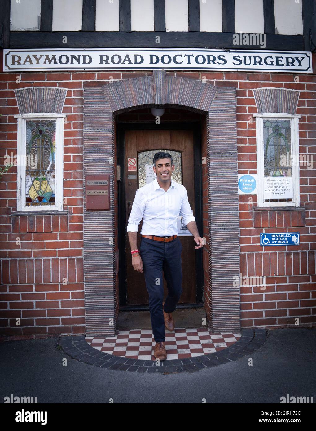 Rishi Sunak during a visit to his father's old doctors surgery where he