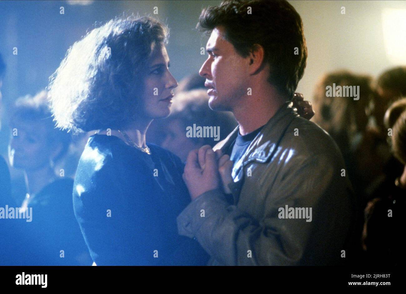 MIMI ROGERS, TOM BERENGER, SOMEONE TO WATCH OVER ME, 1987 Stock Photo