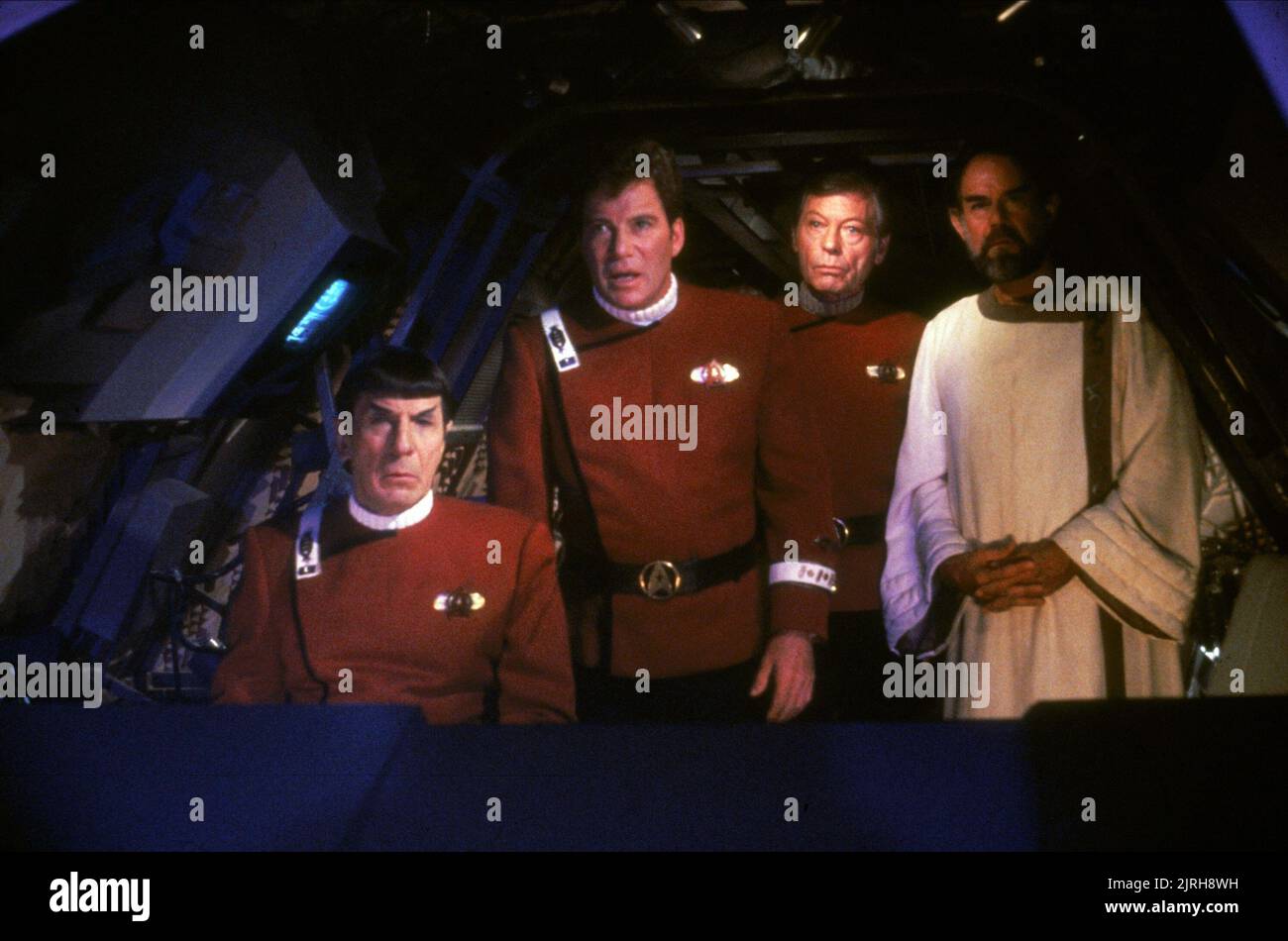 LEONARD NIMOY, WILLIAM SHATNER, DEFOREST KELLEY, LAURENCE LUCKINBILL, STAR TREK V: THE FINAL FRONTIER, 1989 Stock Photo
