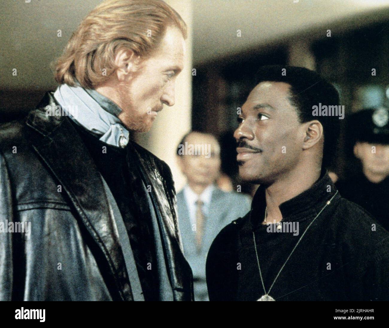 CHARLES DANCE, EDDIE MURPHY, THE GOLDEN CHILD, 1986 Stock Photo