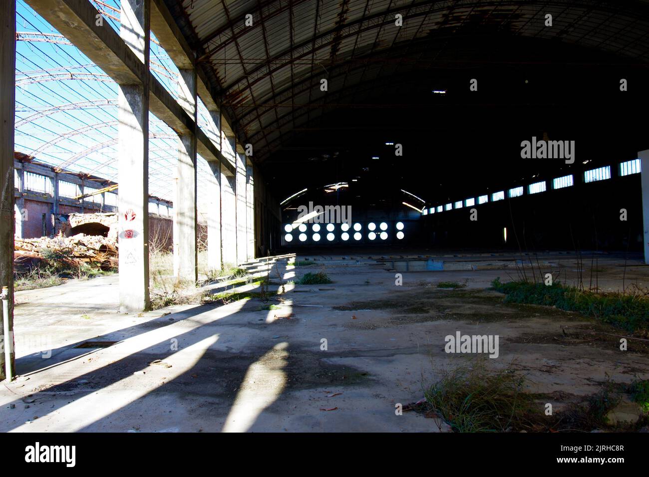 Old abandoned and decaying factory, now everything is corroded by rust ...