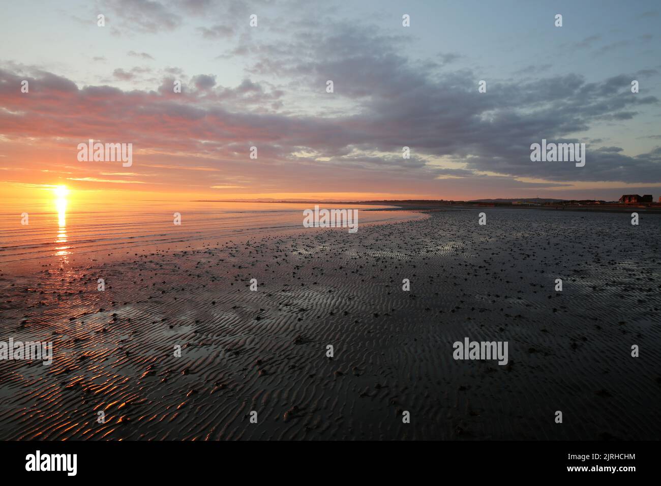 Prestwick, Ayrshire, Scotland, UK. The sun sets of the Firth of Clyde